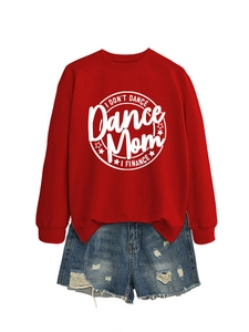 Flat lay of red crewneck sweatshirt with 'I FINANCE' text and frayed denim shorts