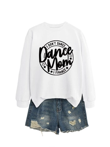 Flat lay of a white crewneck sweatshirt with Dance Mom print and distressed denim shorts