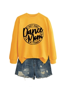 Detail of yellow sweatshirt with black finance lettering and frayed denim shorts set