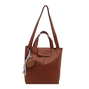 Brown PU leather tote bag with flap closure and decorative bear charm and plaid scarf