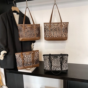Retro leopard print tote bags in brown and grey canvas with leather accents for winter