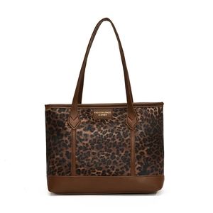 Vintage leopard print tote bag with brown leather handles and fashion nameplate