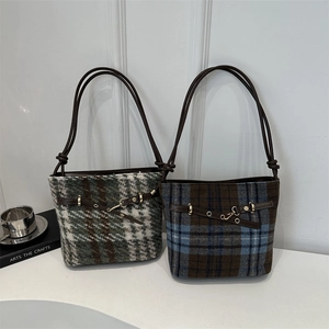 Chic checkered wool bucket bag for women with leather trim in green and blue plaid patterns