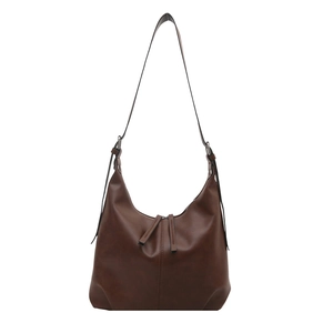 Brown vintage hobo tote bag with vertical stitching and adjustable shoulder strap