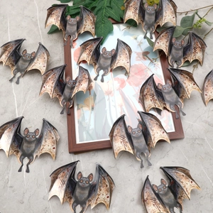 Detailed view of 3D layered bat wall stickers with realistic wings for Halloween decor