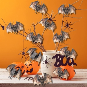 Detailed view of Halloween 3D bats with bloody textures hanging on dry branches