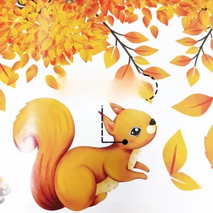 Detail showing self-adhesive backing of the autumn squirrel wall sticker with maple leaves