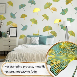 Detail of golden and blue ginkgo leaf wall stickers with hot stamping texture for home decor