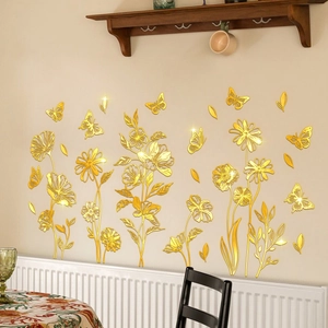 Detailed view of 3D golden mirror floral wall stickers with butterflies on a warm beige wall