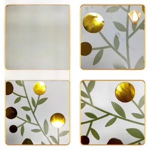 Detail of waterproof wall sticker showing gold foil accents and green leaf patterns