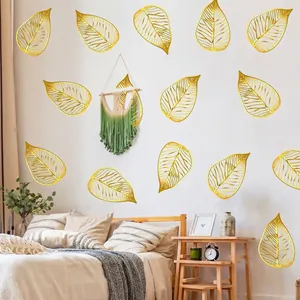 Golden ginkgo leaf wall stickers with hollow veins for modern bedroom decoration