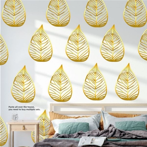 Detailed view of creative golden ginkgo leaf wall stickers with hollowed design for decor