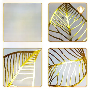 Detail of waterproof gold ginkgo leaf wall sticker showing metallic texture and veins