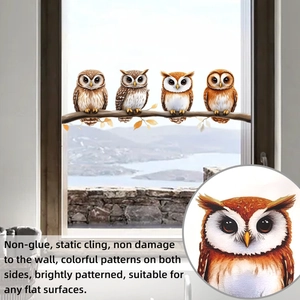 Detailed view of owl window stickers with vibrant double-sided print on glass surfaces
