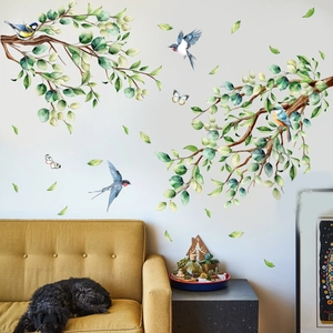Cartoon watercolor wall stickers with birds, branches and butterflies on white wall