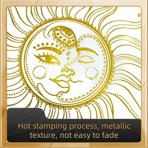 Macro detail of sun and moon gold foil wall decal showing premium metallic hot stamping texture