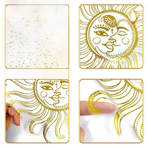 Detail of waterproof gold sun and moon wall decals with shiny metallic texture