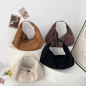 Minimalist faux suede tote bags in four colors with wide shoulder straps and zipper closure