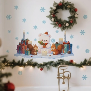 Christmas wall decals featuring polar bear, squirrels, and blue snowflakes on a white wall