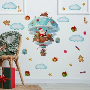 Detail view of festive Santa on hot air balloon wall stickers in cozy living room decor