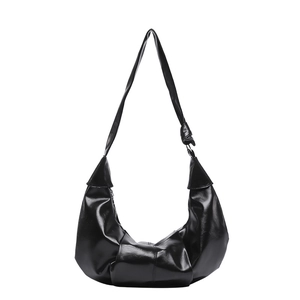 Retro black glossy hobo bag with pleated texture and stylish knotted shoulder strap