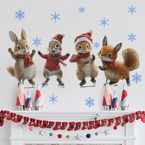 Close-up of cute Christmas squirrel and rabbit wall stickers on a festive fireplace wall