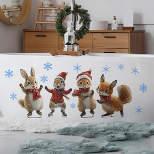 Detail of Christmas animal stickers with squirrels and rabbits on a white bathtub