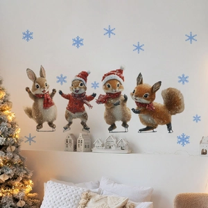 Detail of cute Christmas squirrels and rabbits wall stickers in a cozy bedroom decor