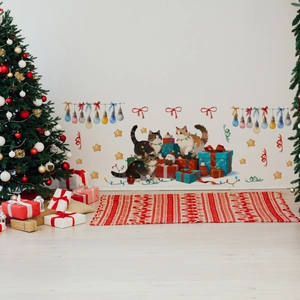 Detail of Christmas wall stickers showing cute cats with festive lights and gift boxes