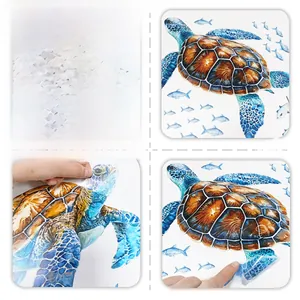 Detail of self-adhesive watercolor turtle wall sticker showing front and reverse side texture