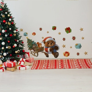 Detailed Christmas wall decals featuring a cartoon bear on a sleigh with festive gift boxes