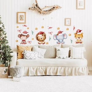 Detail of cute self-adhesive Christmas animal wall stickers featuring a monkey and lion