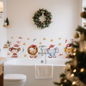 Detail of Christmas animal wall decals with cute monkey, lion and elephant on smooth bathroom tiles