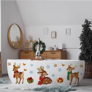 Detailed Christmas wall decals with cartoon deer, snowflakes, and stars on a white bathtub