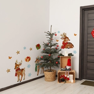 Detail of Christmas wall stickers showing cute deer and snowflakes in a cozy room