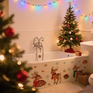 Cute Christmas reindeer and snowflake wall decals applied to a bathtub for holiday decor