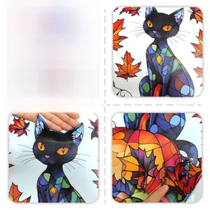 Detail of stained glass style window sticker featuring autumn cat, maple leaf and pumpkin