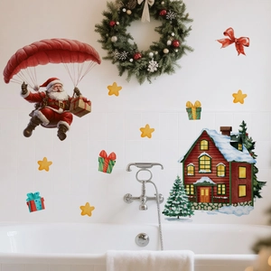 Creative Christmas wall stickers featuring Santa and festive snowy house on bathroom tile
