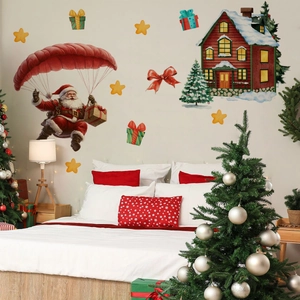 Detail of Santa Claus paragliding with red cottage wall stickers in a cozy bedroom
