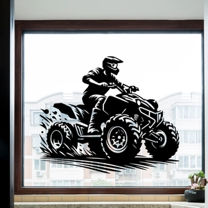 Dettaglio dell'adesivo nero con silhouette di pilota ATV con schizzi di fango e texture