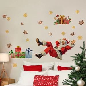 Detail showing watercolor Santa Claus and colorful gift box stickers on bedroom wall