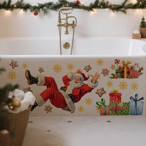 Close-up of Santa Claus and gift stickers applied on a white bathtub surface