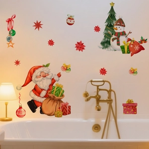 Detail of hand-painted Santa and snowman wall stickers on bathroom tile for Christmas