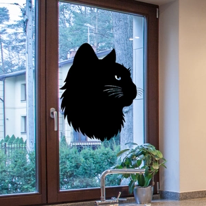 Vista dettagliata di un adesivo statico a silhouette di gatto nero su vetro