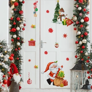 Detail of Christmas wall decals showing Santa and snowman on a white door