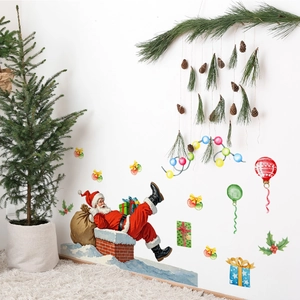 Cozy home corner with watercolor Santa Claus on chimney and festive gift box wall stickers