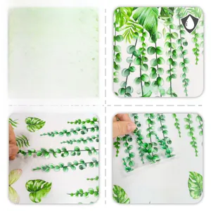 Detail of waterproof tropical leaf window stickers showing adhesive back and vine patterns