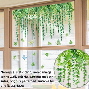 Detail of static cling window film with tropical green leaves and butterflies pattern