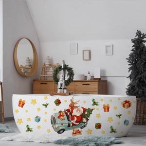 Detail of waterproof Christmas Santa stickers with reindeer and gifts on a bathtub