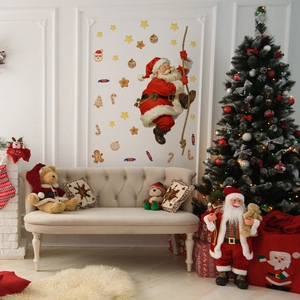 Detail of Christmas wall stickers featuring Santa on rope with gingerbread and stars